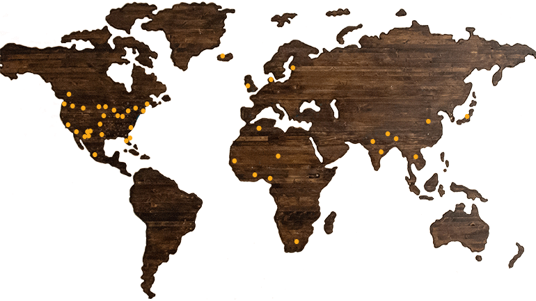 Image of world map with yellow dots showing client locations